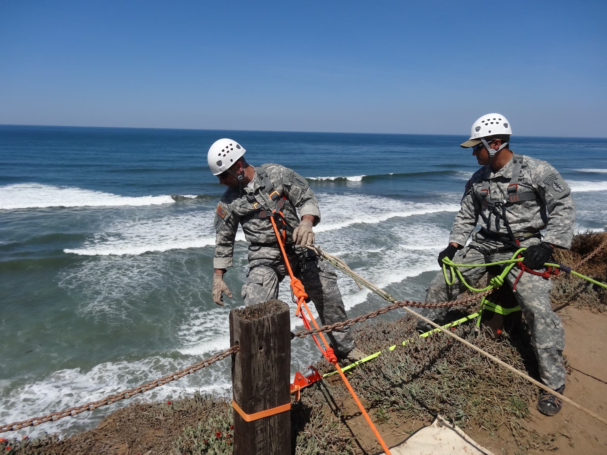 Sal Rossano running rappelling training on a coastal cliff